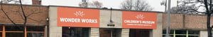 Wonder works children 's museum is located on a brick building