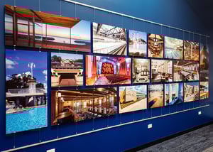 Acrylic wall display with various images on W.B. Olson's office wall.